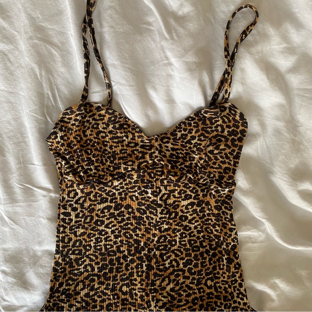 Out from under leopard bodysuit